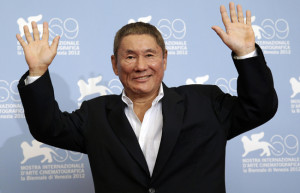 Japanese director Kitano poses during the photocall of the movie "Outrage Beyond" at the 69th Venice Film Festival